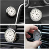 Close-up views of a mini car vent quartz clock with luminous hands mounted in a vehicle interior.