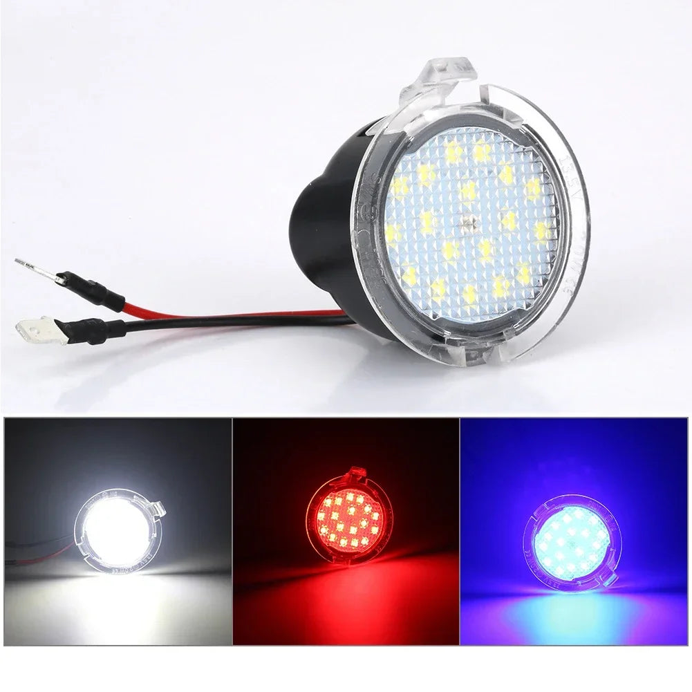 Universal LED side mirror puddle light illuminating the vehicle area.