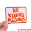 An orange embroidered patch with the text NO WEENIES ALLOWED on a white background.