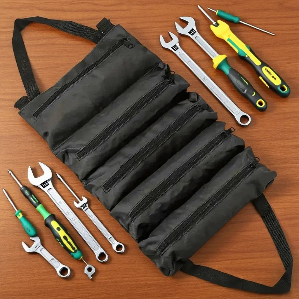 A black roll-up multi-pocket tool organizer bag filled with various hand tools and screwdrivers.