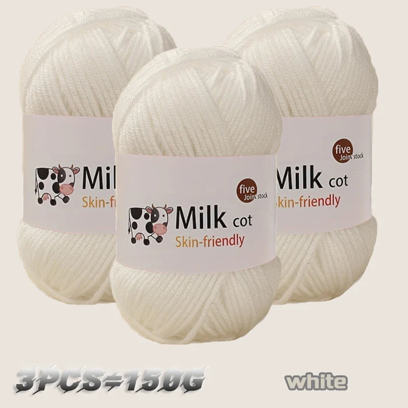 Three skeins of white silk-friendly milk cotton yarn for knitting and crochet