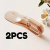 Two rose gold mattress lifter wedge tools are shown on a light background.