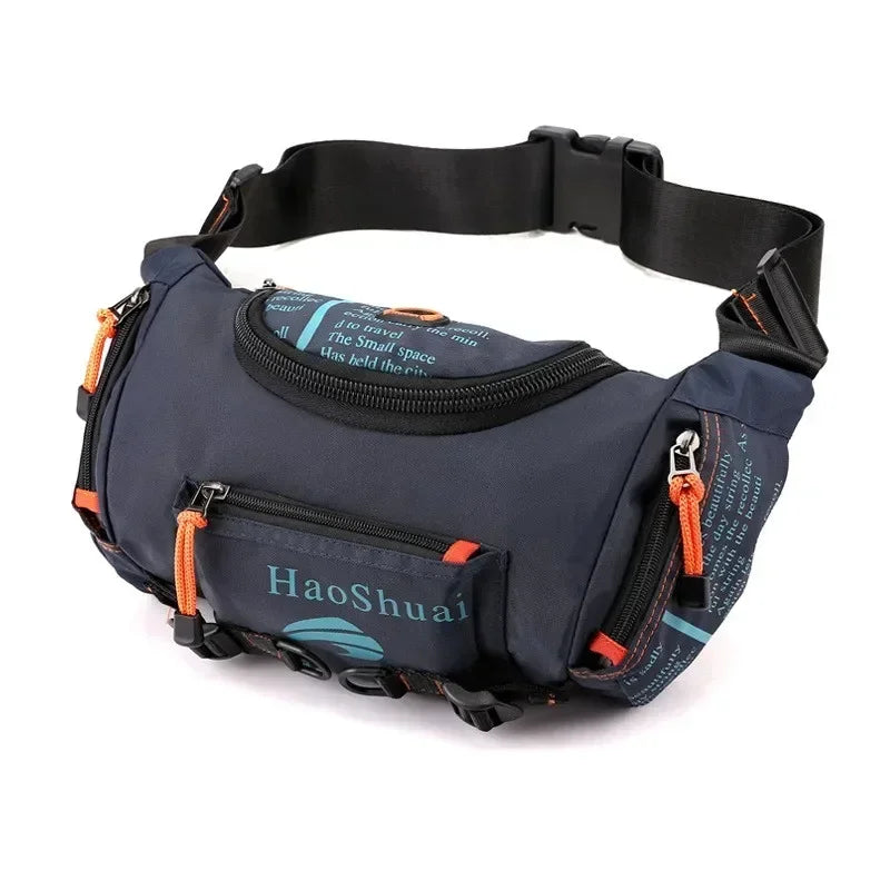 A dark blue tactical chest bag with an orange accent strap and a black adjustable strap.