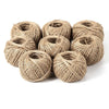 A pile of natural jute twine rolls used for crafts, gift wrapping, and décor.