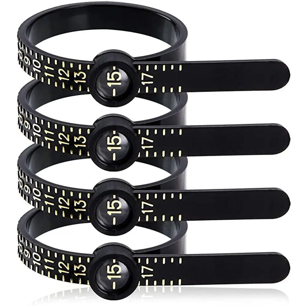 A black ring sizer measuring tool with a magnifier showing various sizes.