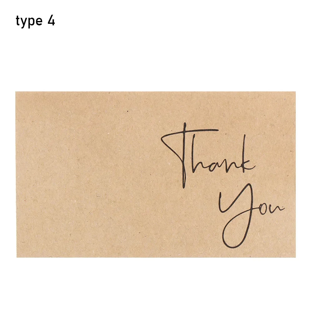A light brown greeting card with handwritten text that says Thank You