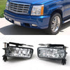 A close-up view of a black front fog light assembly with clear bulbs for a Cadillac Escalade.