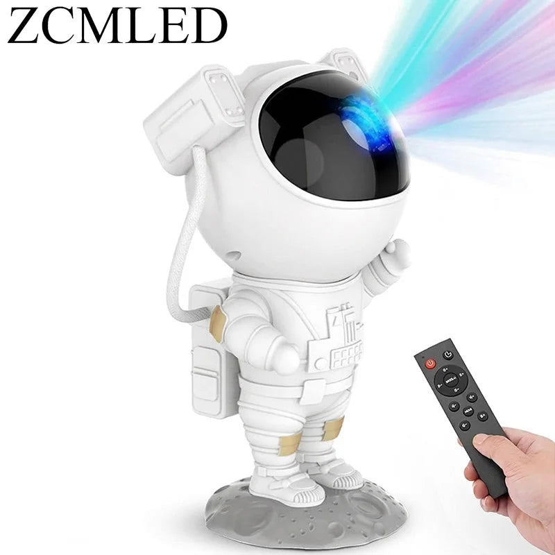 A white astronaut figure projector emitting a blue light, shown with its remote control.