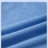 Close-up of a blue microfiber cleaning cloth showing its textured, soft surface.