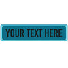 A rectangular teal metal sign with the text YOUR TEXT HERE in white capital letters.