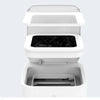 White replacement refill rings for a smart kitchen trash can with an open lid.