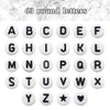 A set of 63 round alphabet letter stickers for crafting and journaling