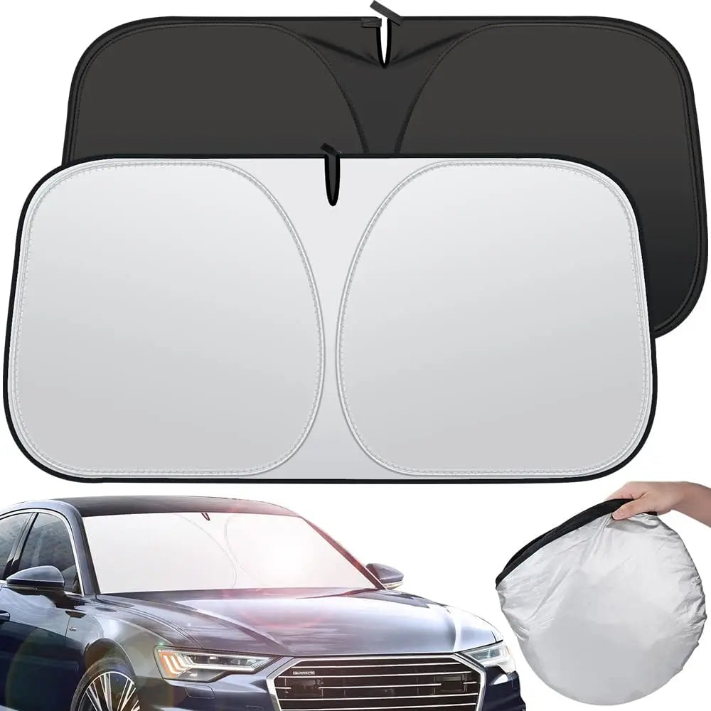 A black foldable windshield sun shade is shown open, with a white version displayed next to a car.