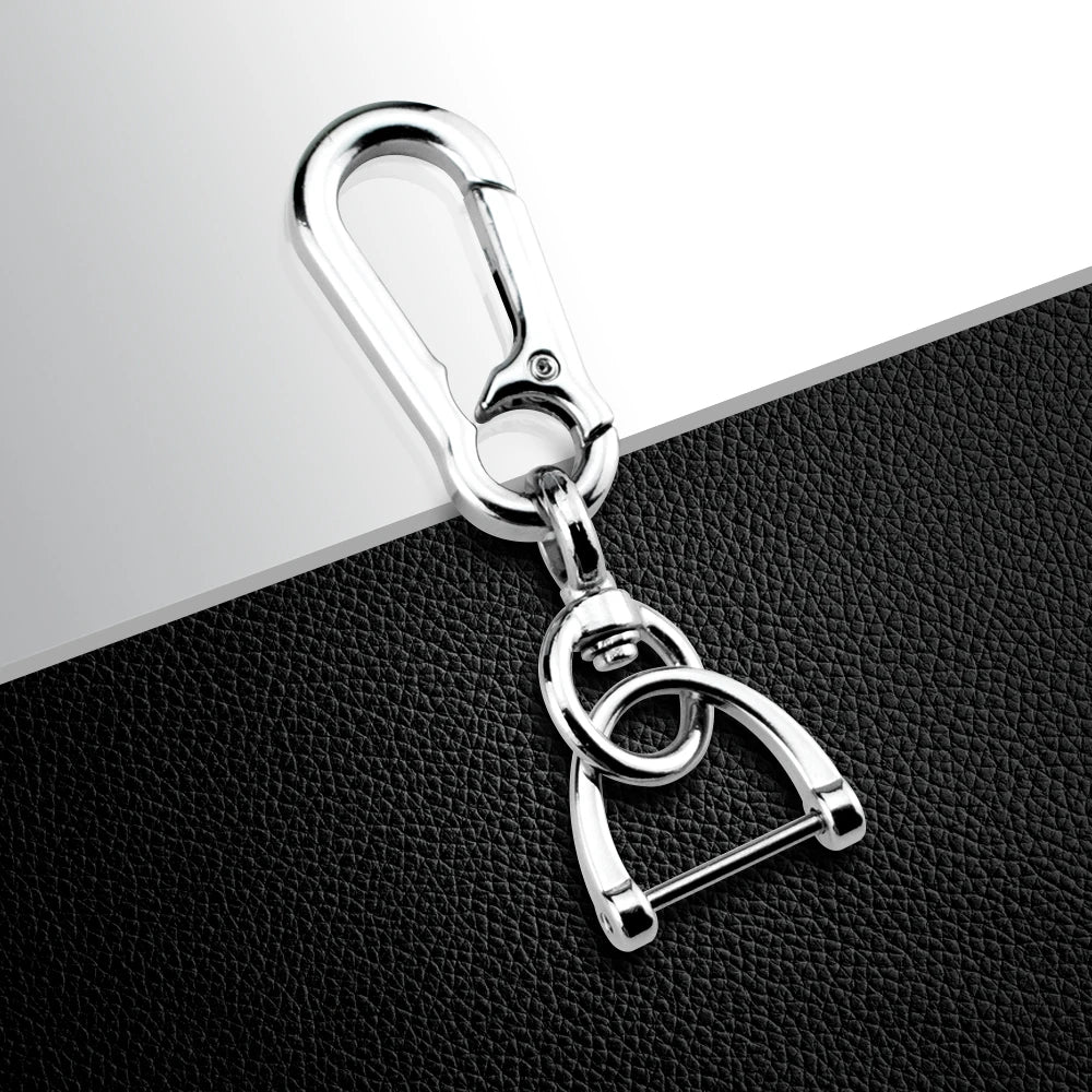 Silver metal split ring key fob cover with a loop and a small ring attached.