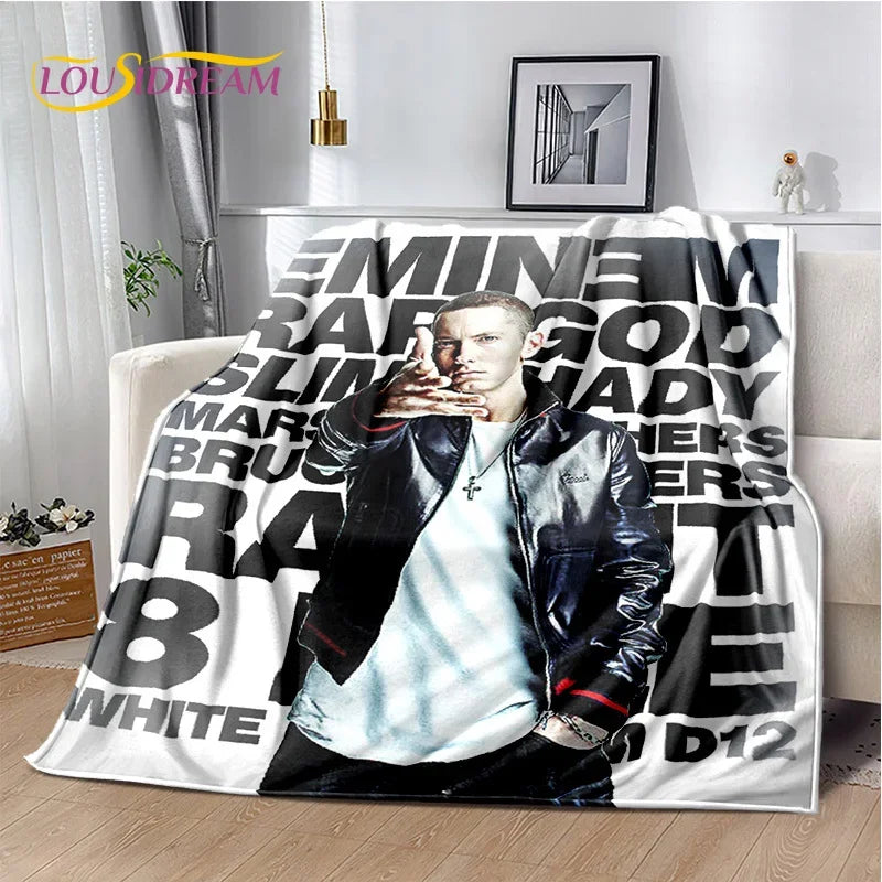 A throw blanket featuring the text Eminem and 2Pac with a black and white graphic design.