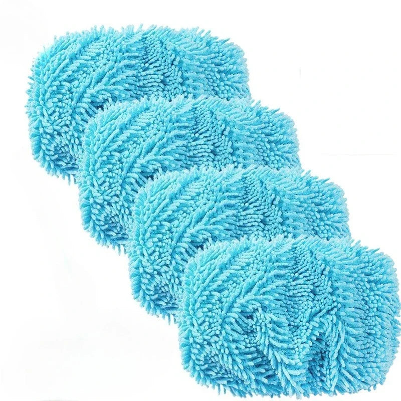 A stack of bright blue reusable microfiber mop pads for a Swiffer sweeper.