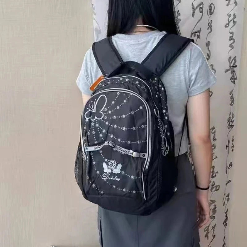 Floral Print Laptop Backpack with Butterfly Accents