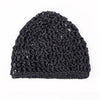 A close-up of a black mesh crochet hair net for sleeping and everyday wear.