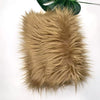 A fluffy, light brown faux fur fabric used for DIY sewing, doll hair, and cosplay.