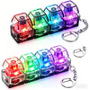 A set of colorful LED macaron keyboard fidget toys packaged as a keychain with silver rings.