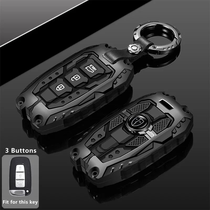 A black protective key fob cover with a metal ring, shown in a close-up view.