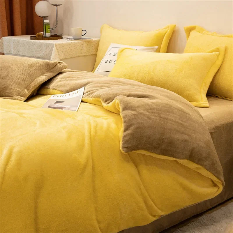 A bright yellow cozy flannel duvet cover spread on a bed with yellow pillows and a neutral-toned blanket.