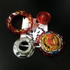 A set of metal battle spinning tops featuring red and gold designs, including a ring, a top, and a disc.