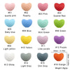 A set of sixteen silicone heart beads in various colors including pink, blue, green, yellow, purple, and orange.