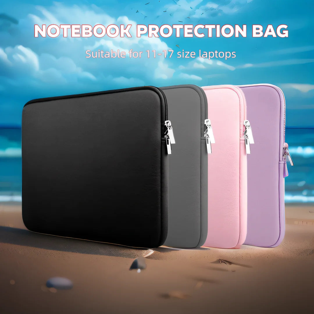 A set of four notebook protection bags or laptop sleeves in black, gray, pink, and purple are displayed on a sandy beach.