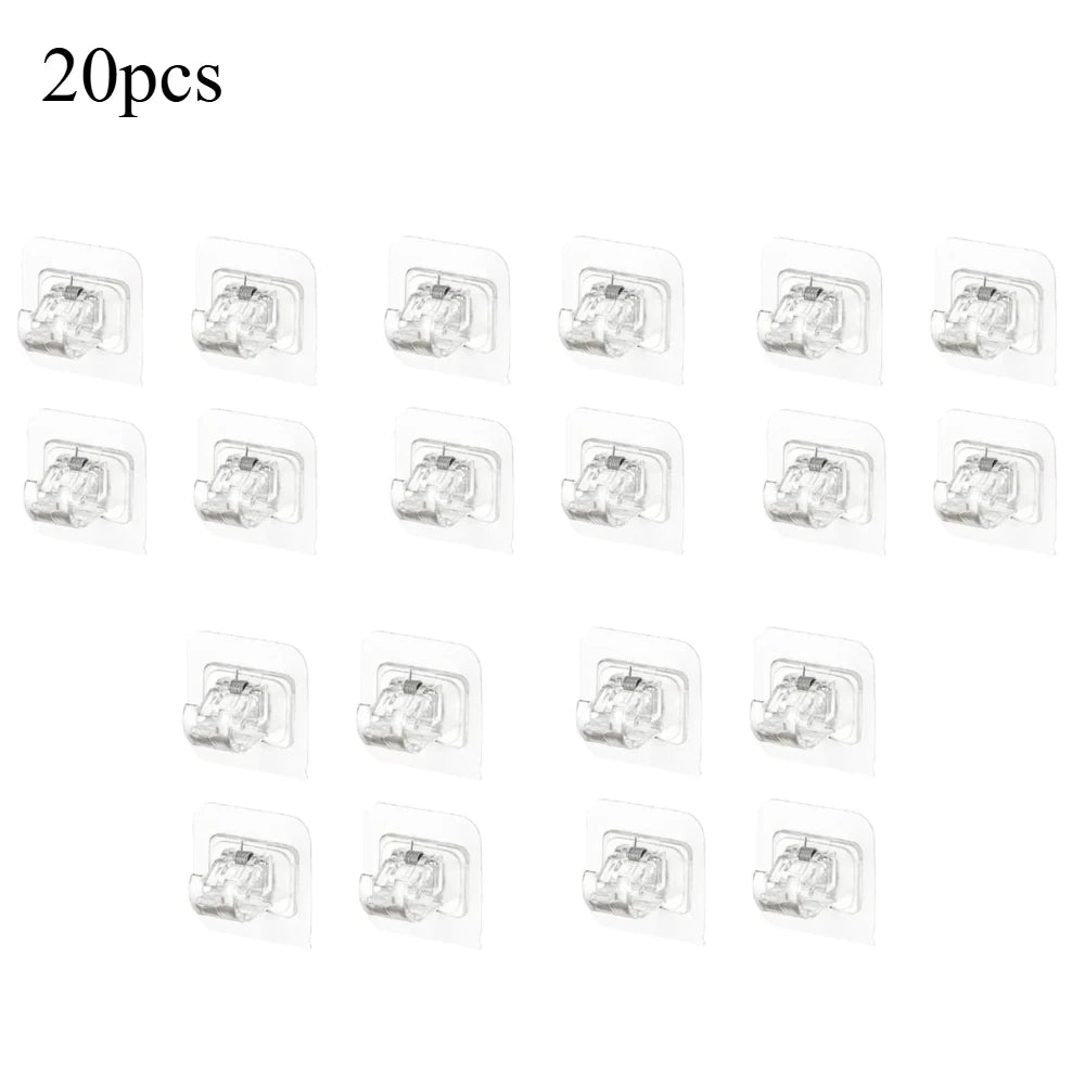 A set of self-adhesive curtain rod hooks in various sizes and finishes.