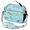 A teal insulated lunch bag featuring cartoon dog illustrations and a gray adjustable shoulder strap.