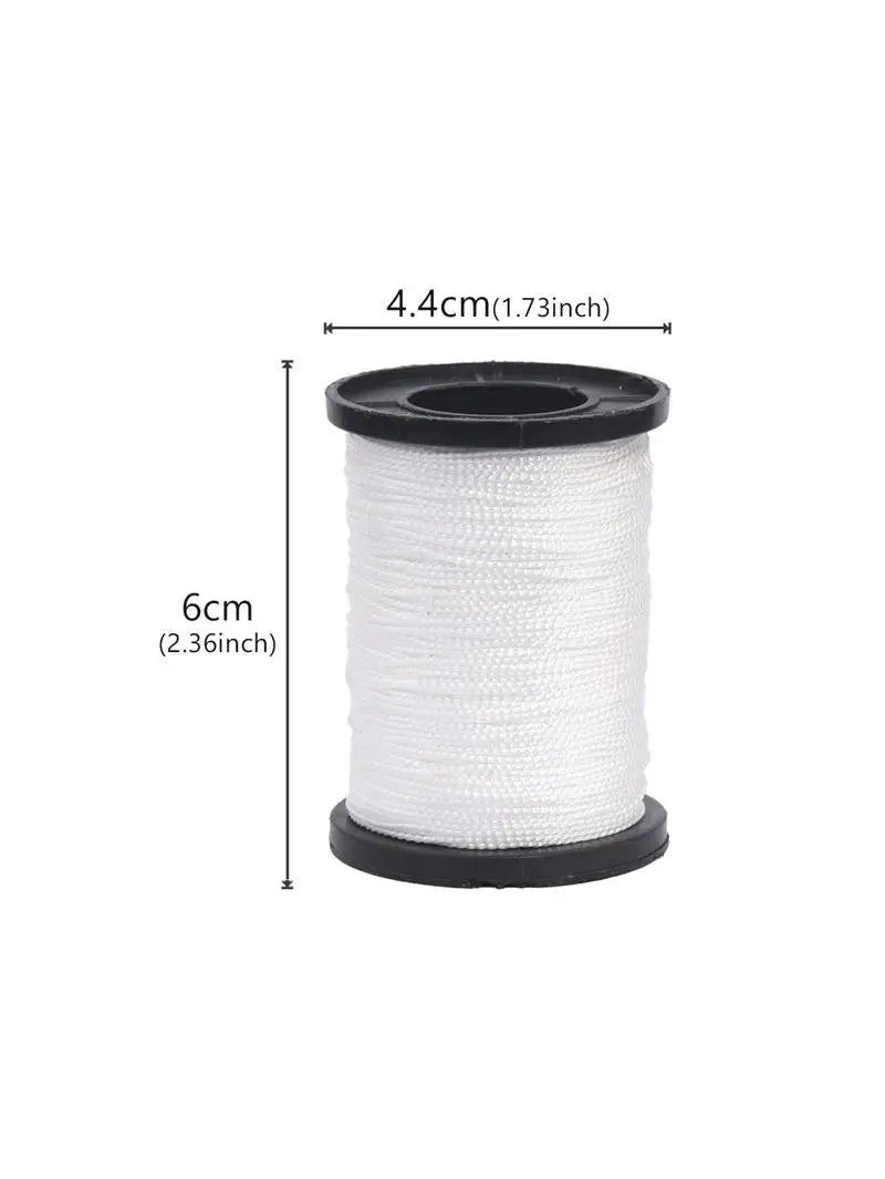 A roll of white leather sewing thread or twine, measuring 6cm long.