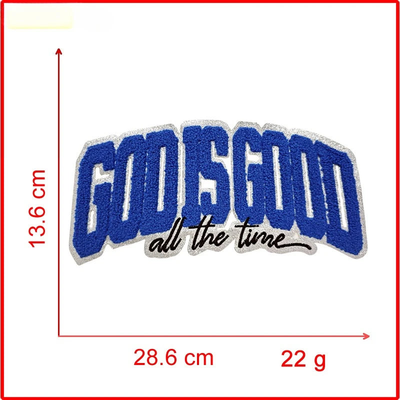 Blue embroidered patch with the text GOD IS GOOD all the time on a white background.