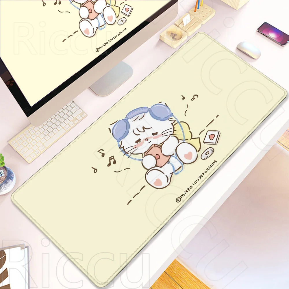 A beige kawaii cartoon illustration of a cat on a gaming desk mat with a non-slip rubber base.