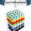 A stack of colorful lazy folding boards for organizing clothes and shirts.