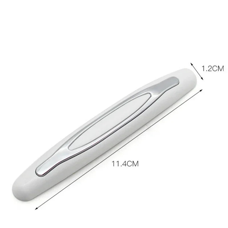 A white car door edge protector strip shown in profile with dimensions of 1.2cm and 11.4cm.