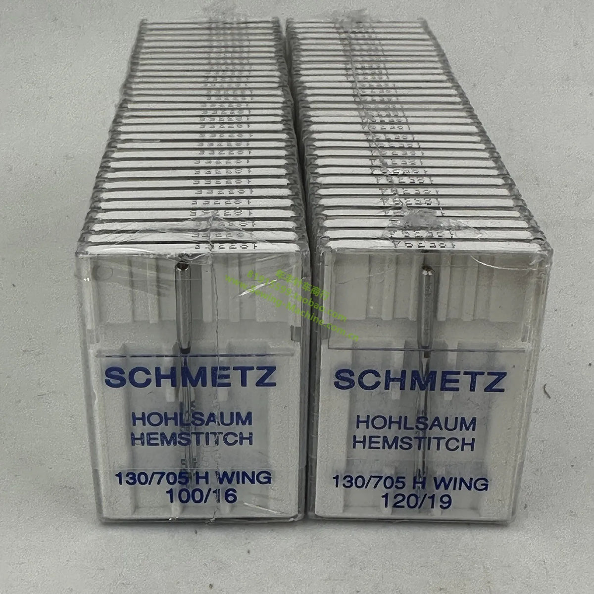 Two boxes of Schmetz wing needles for sewing machines, labeled 130/705 H wing.