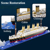 A model kit of a Titanic ship built from interlocking plastic bricks, showing scene restoration details like a cabin and chim