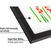 A black molding photo frame displays artwork both horizontally and vertically.