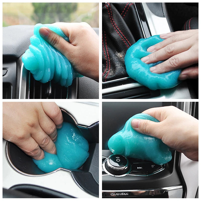 A hand is using a reusable turquoise cleaning gel to wipe down car interiors and electronics.