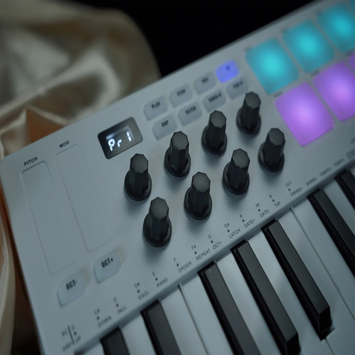 Portable 25-Key MIDI Controller with Pads and Wireless Connectivity