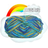 A ball of 17-ply yarn in various shades of blue, green, and yellow, set against a white cloud with a rainbow background.