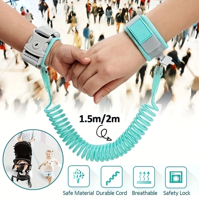 A pair of hands holding a teal wrist link strap for toddlers, demonstrating its 1.5m/2m length and features.