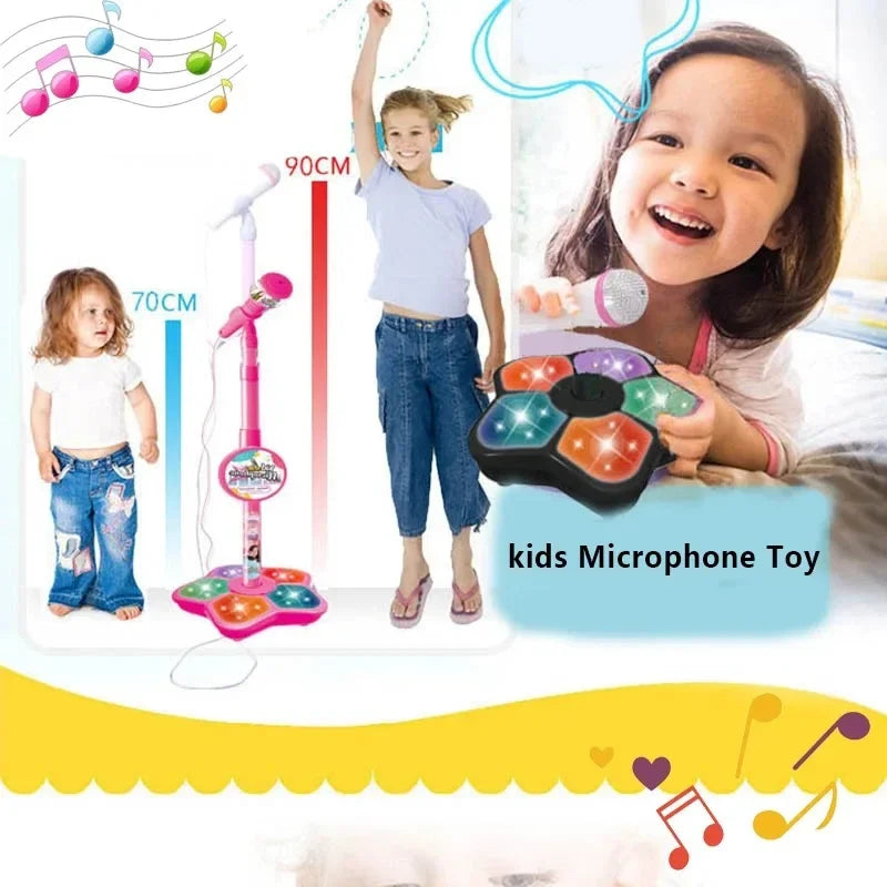 A young girl stands next to a microphone stand and holds a colorful kids microphone toy for karaoke.