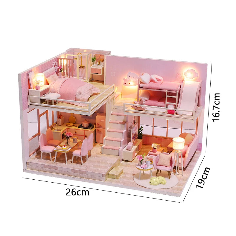 A miniature wooden dollhouse building kit featuring pink furniture and interior rooms with lighting.