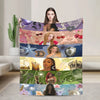 A colorful fleece throw blanket featuring various designs including hearts, stars, and faces.