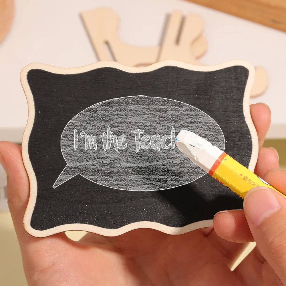 A hand holds a mini wooden chalkboard sign with the text I'm the lead written on it.