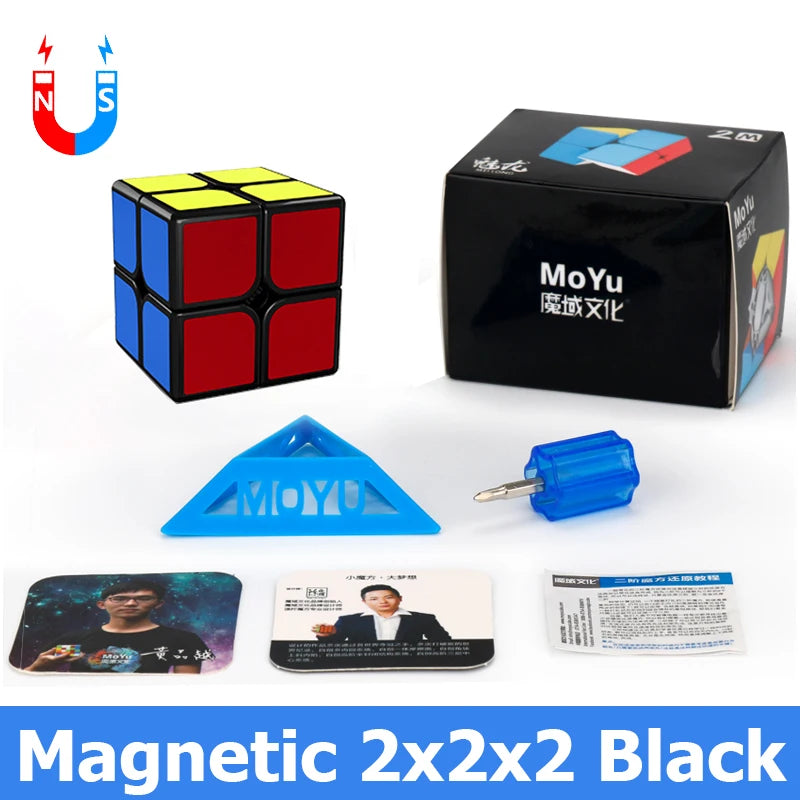 A black MoYu 2x2 cube set, a blue magnetic cube, and related accessories are displayed on a white background.