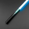 A close-up view of an RGB heavy dueling lightsaber with a metal hilt and glowing blue blade against a dark background.