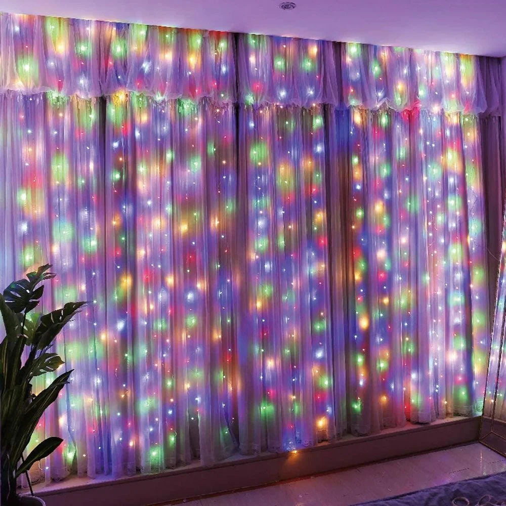 Purple and pink LED curtain lights with colorful twinkling lights covering a window or wall.